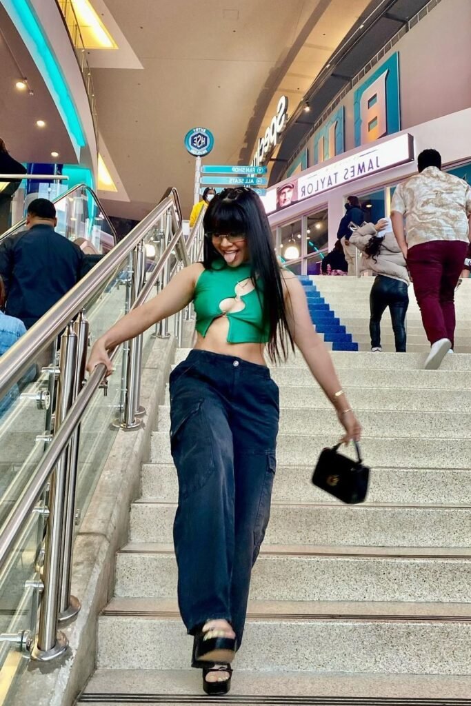 Green Cut-Out Halter Crop Top + Black Wide-Leg Cargo Pants + Black Platform Sandals