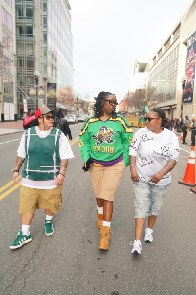 Green Mighty Ducks Jersey / Green Fuzzy Vest + Tan Cargo Shorts / Distressed Denim Shorts + Green Sneakers / Timberland Boots / White Sneakers