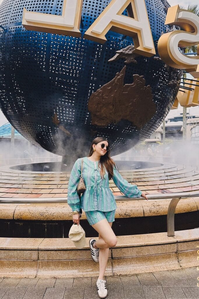 Green Striped Peplum Top + Matching Striped Shorts + Black and White Sneakers