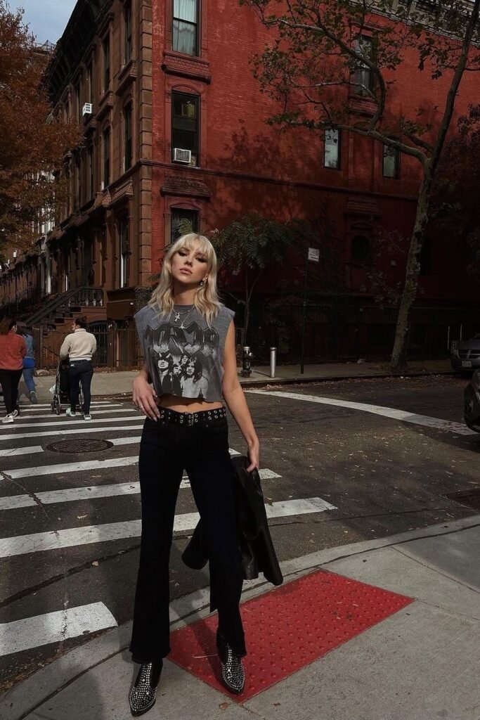 Grey Graphic Crop Top + Black Flared Jeans + Studded Pointed-Toe Boots