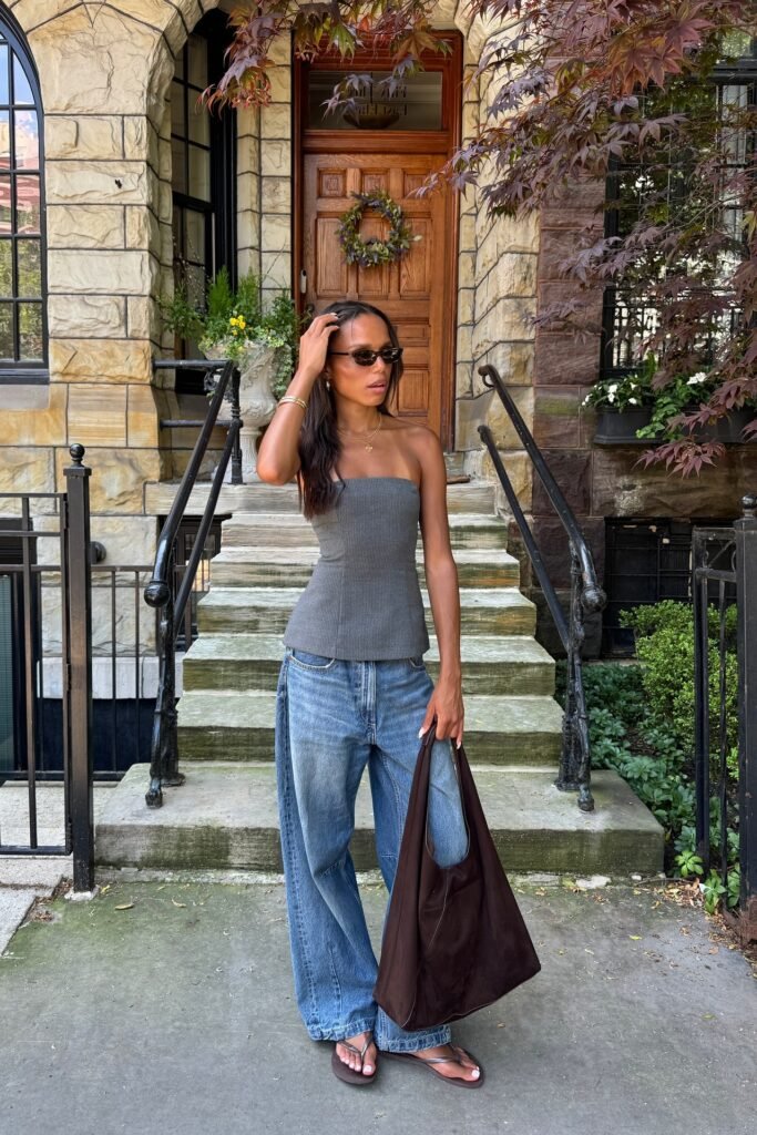 Grey Strapless Knit Top + Wide-Leg Blue Jeans + Brown Flip Flops