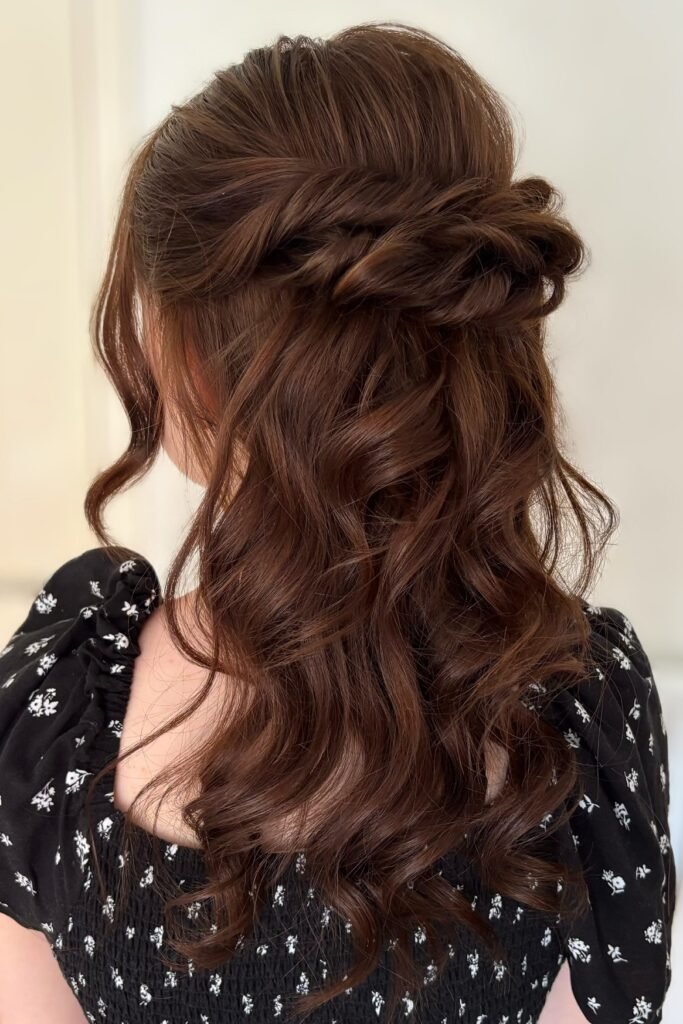 Half-Up French Twist with Loose Barrel Curls and Face-Framing Layers