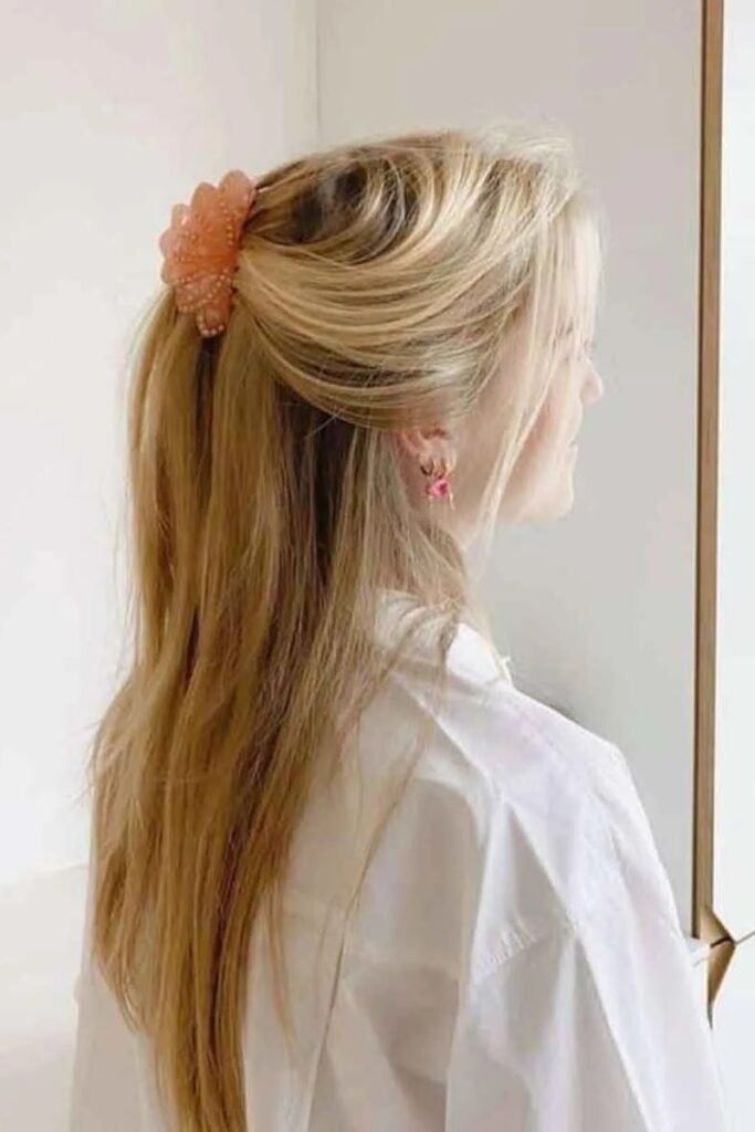 Half-Up Half-Down Style with Decorative Peach Claw Clip