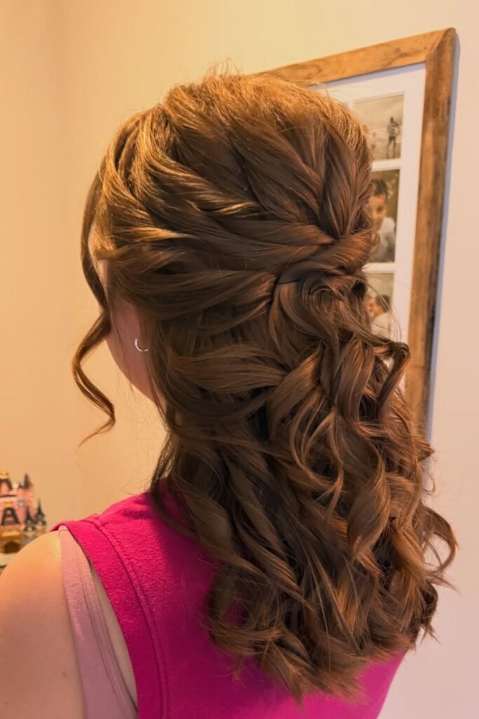Intricate Criss-Cross Half-Updo with Cascading Brunette Ringlets