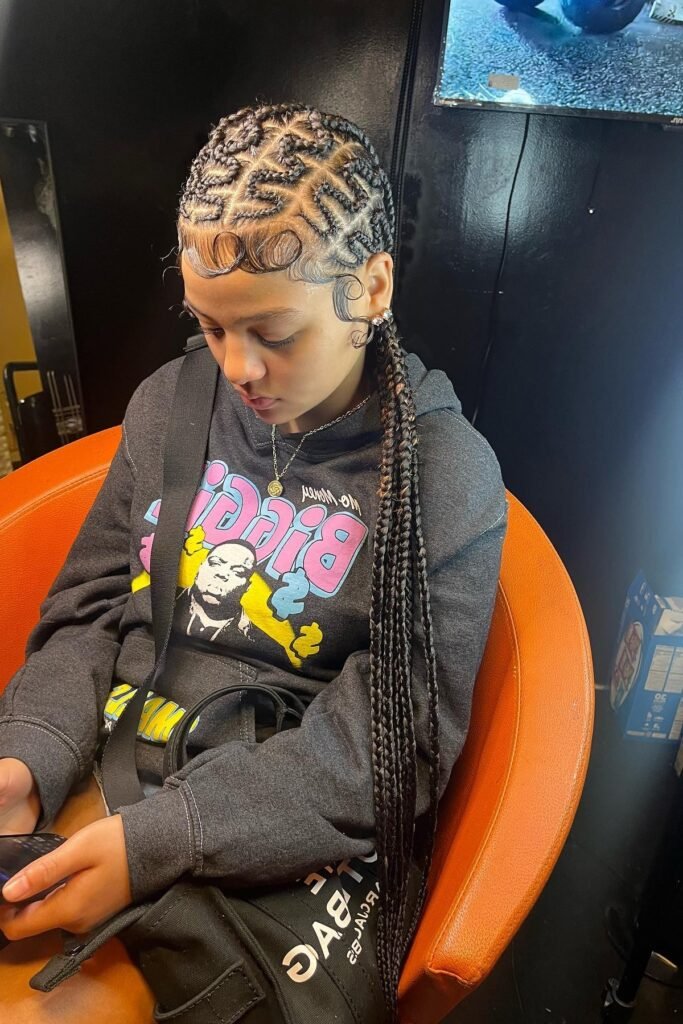 Intricate Maze-Style Braided Updo with Dramatic Sculpted Baby Hairs