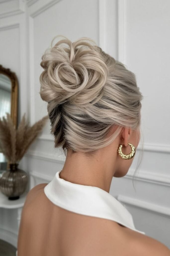 Intricate Rose-Shaped High Bun with Polished Finish