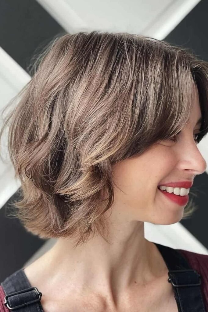 Layered Brunette Bob with Side-Swept Bangs