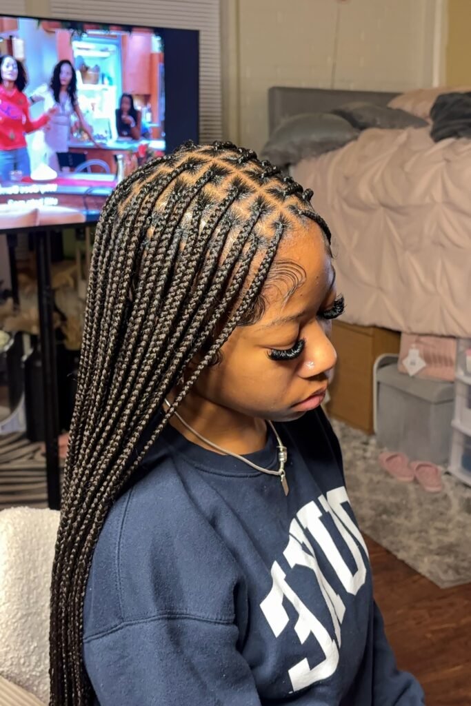 Long Waist-Length Knotless Braids with Sculpted Baby Hairs