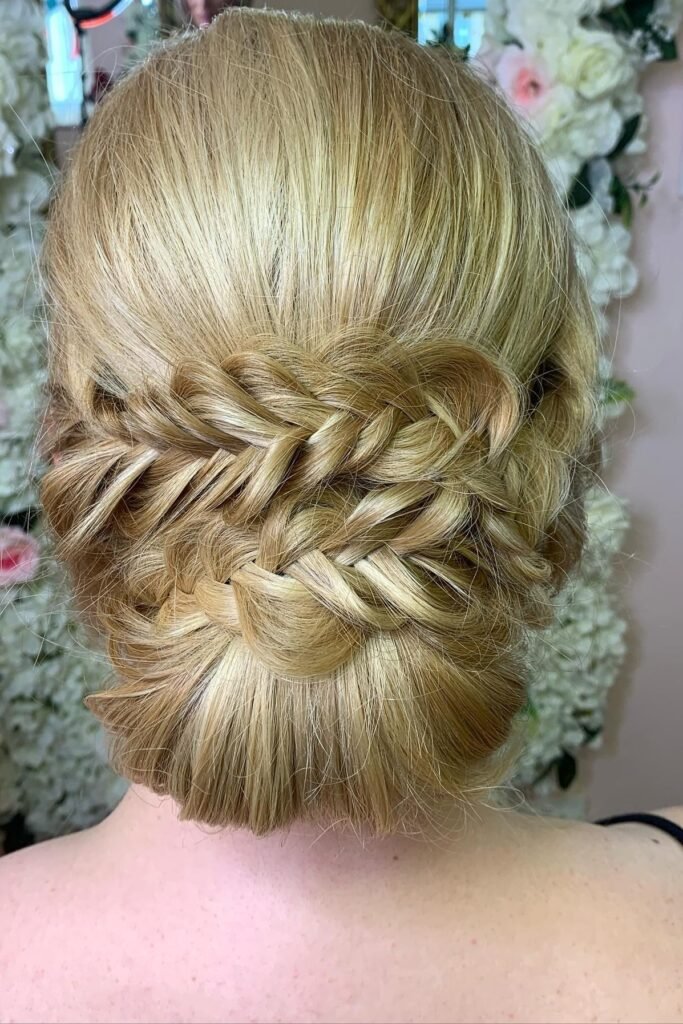 Low Chignon with Overlapping Fishtail Braids