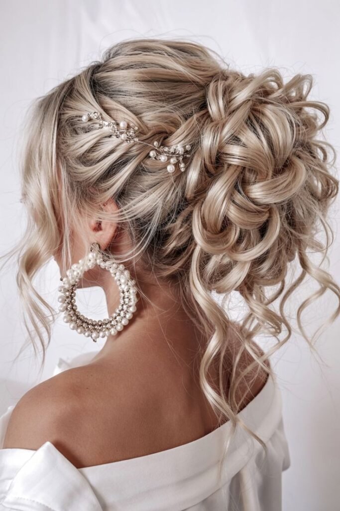 Messy Textured Updo with Pearl Headpiece and Spiral Tendrils