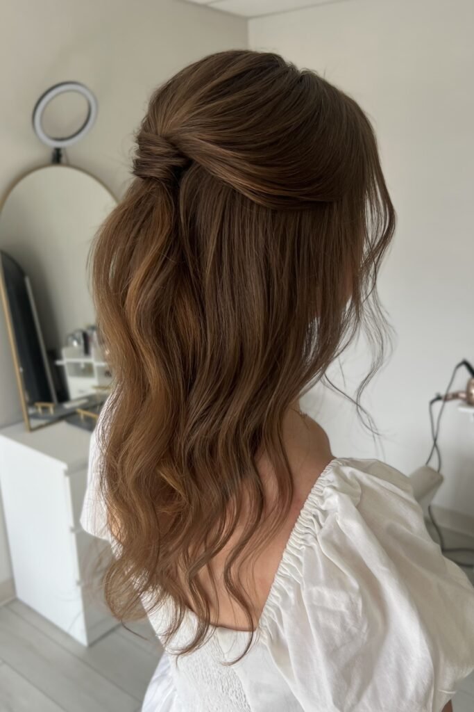 Minimalist Half-Up Knot with Soft S-Pattern Waves and Face-Framing Strands