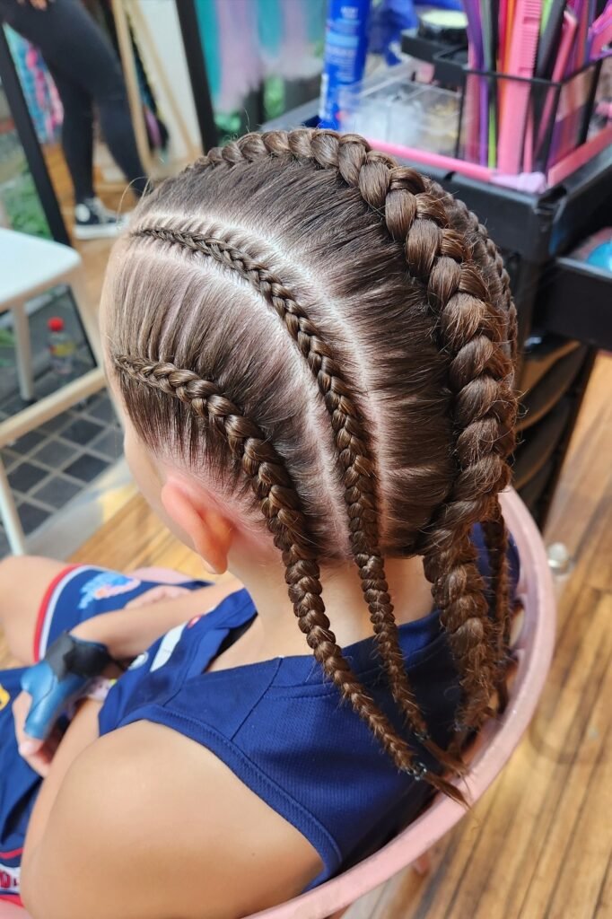 Multi-Strand Feed-in Braids with Varying Thickness