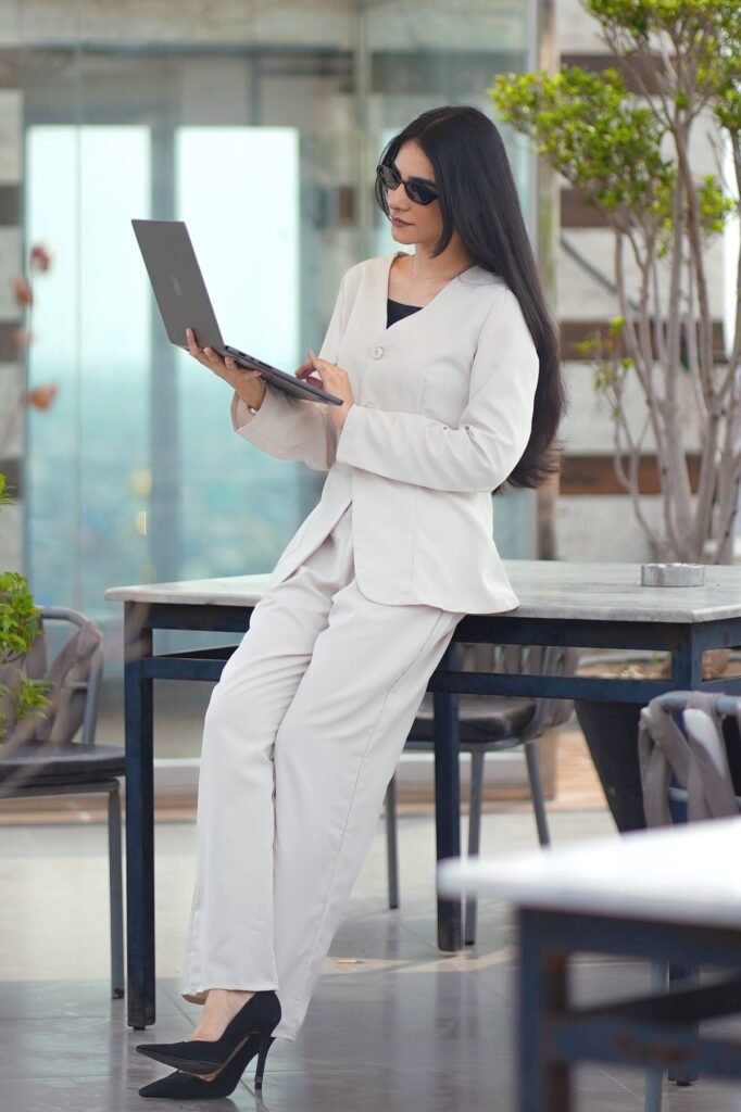 Off-White Oversized Blazer + Matching Off-White Wide-Leg Trousers + Black Pointed-Toe Pumps