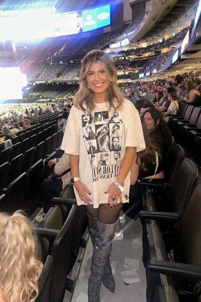 Oversized Cream Taylor Swift Graphic Tee + Black Tights + Glittery Silver Thigh-High Boots