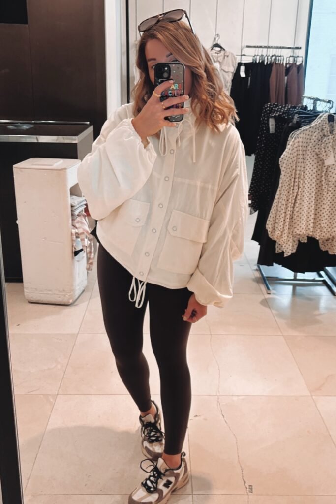 Oversized Cream Utility Jacket + Black Leggings + Beige and Brown Sneakers