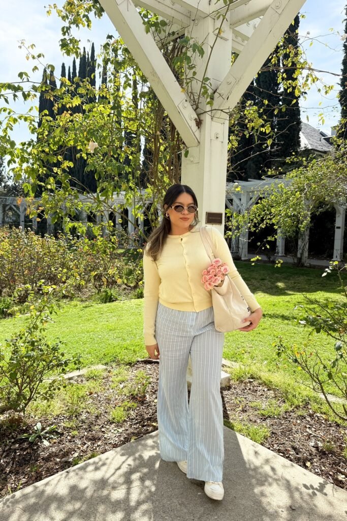 Pale Yellow Cardigan + Blue Pinstriped Wide-Leg Pants + White Sneakers