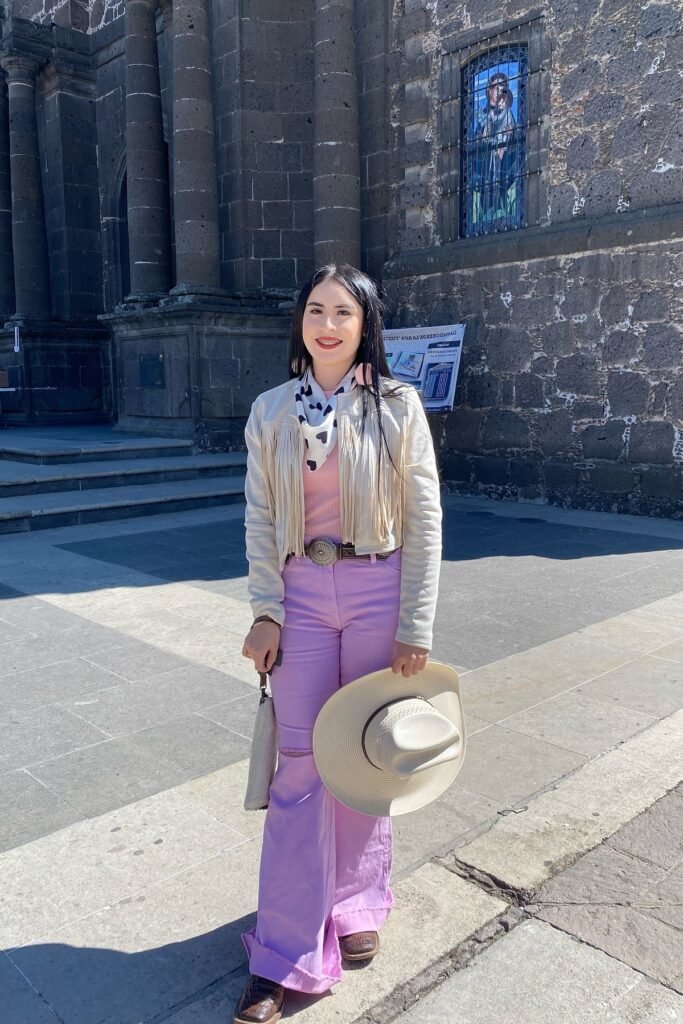 Pink Ribbed Top + Cream Fringe Jacket + Lavender Flare Jeans + Straw Cowboy Hat