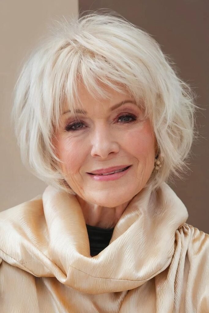 Platinum Blonde Shaggy Bob with Wispy Fringe