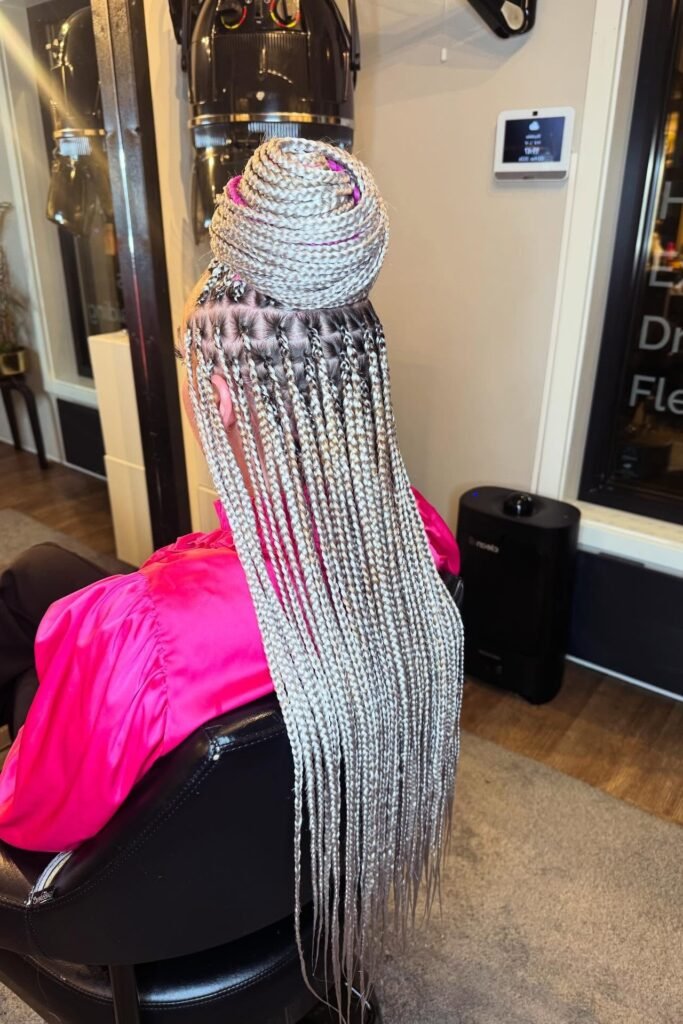 Platinum Silver Braided Bun with Cascading Lengths