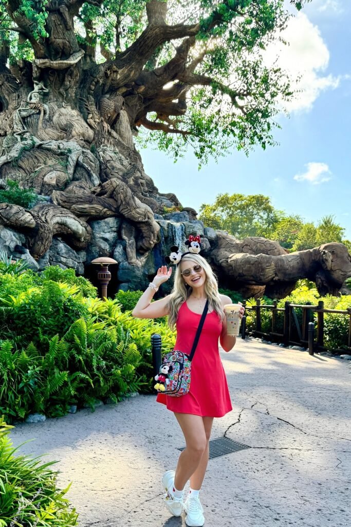 Red Mini Dress + Colorful Disney Pattern Crossbody Bag + Mickey & Minnie Mouse Ears + White Sneakers