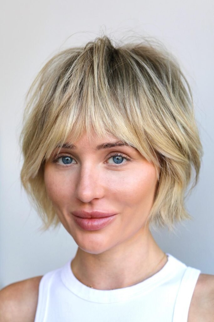 Shaggy Blonde Bixie with Full Textured Bangs