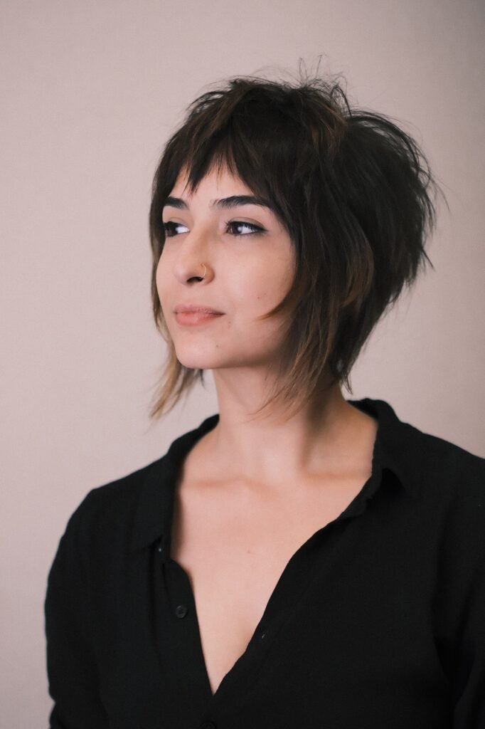 Sharp Asymmetrical Wolf Cut with Jagged Layers