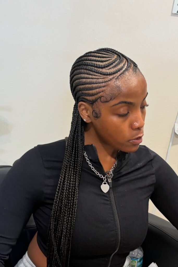 Side-Swept Cornrows with S-Shaped Waves and Sleek Baby Hair
