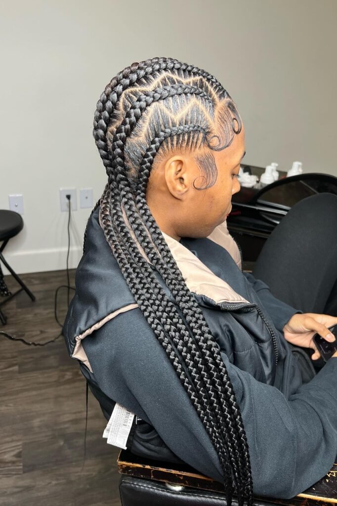 Side-Swept Feed-In Braids with Sculpted Edges