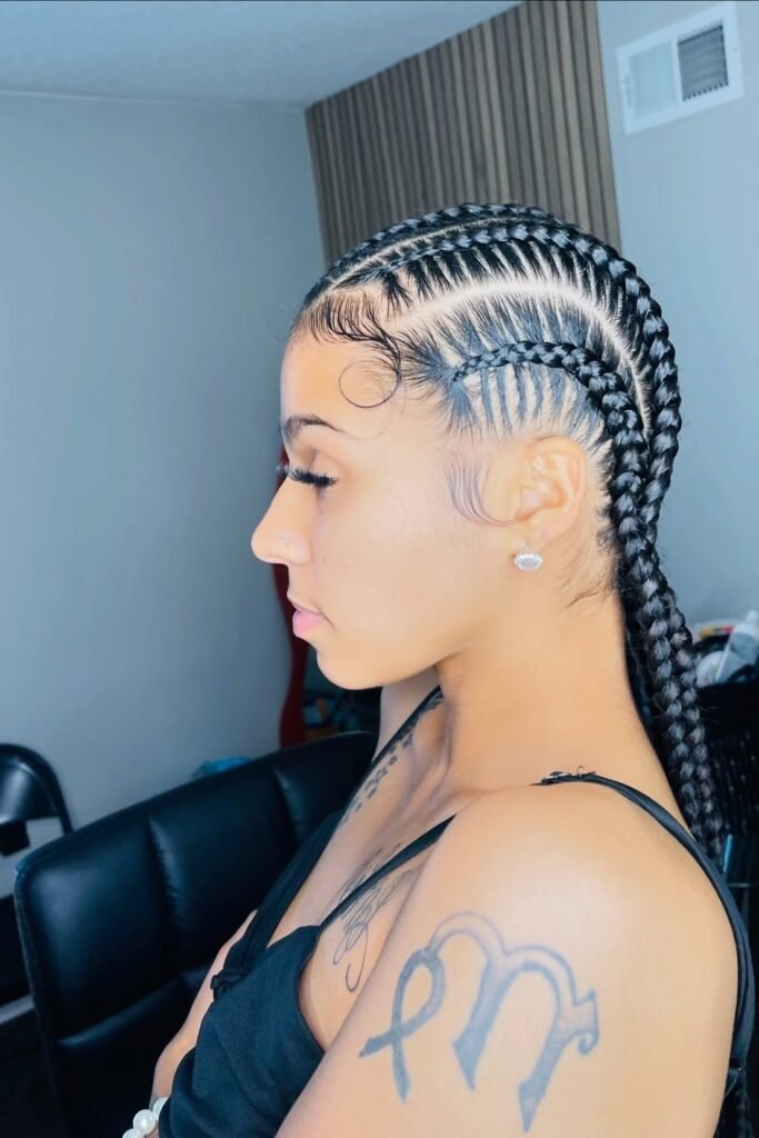Side-Swept Feed-in Braids with Elaborate Baby Hair Styling
