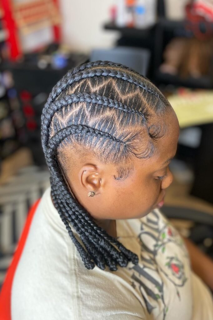 Side-Swept Stitch Braids with Intricate Triangular Parting