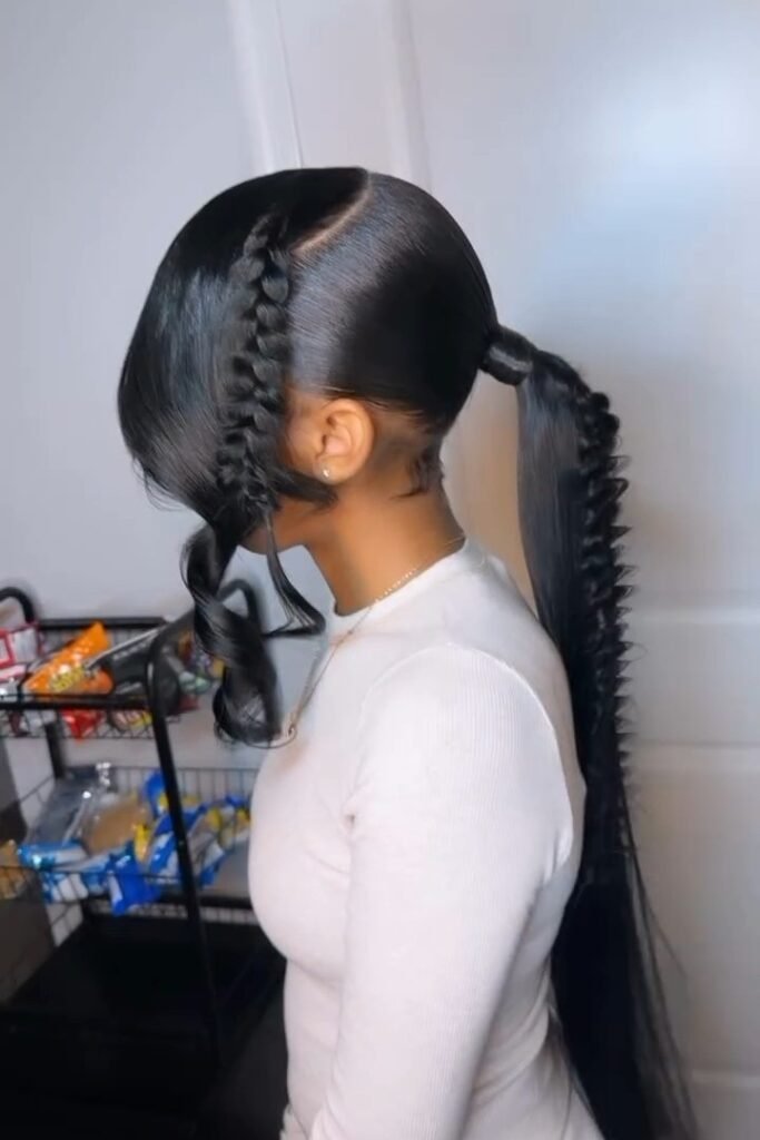 Sleek High Ponytail with Statement Bubble Braid Detail