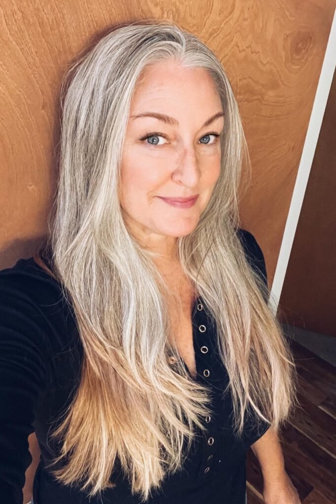 Sleek Silver-Grey Hair with Subtle Warm Lowlights