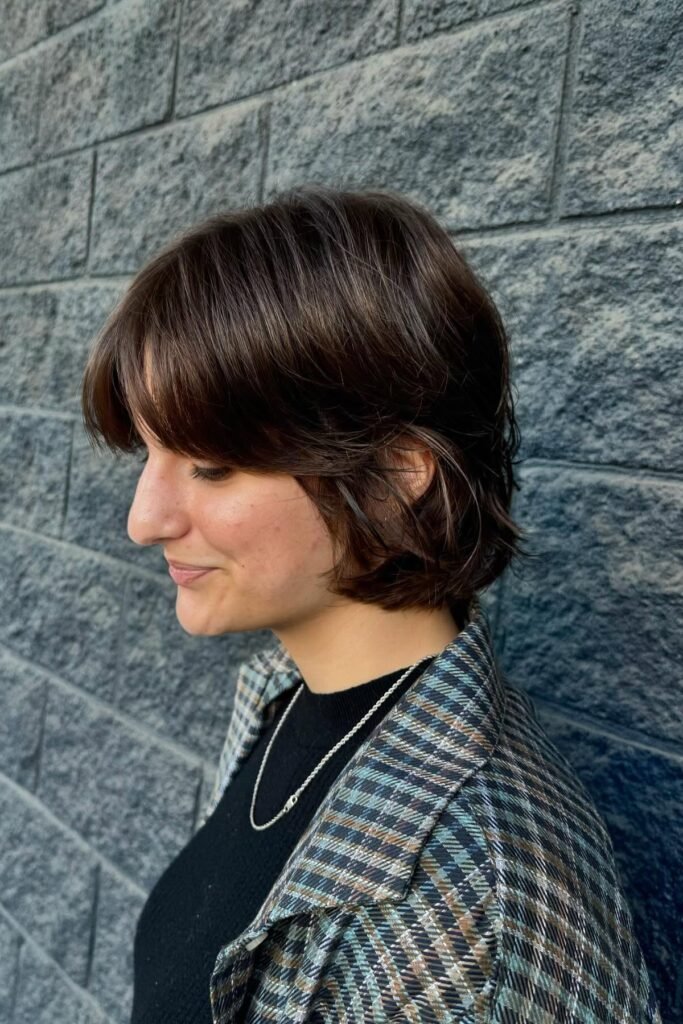 Soft Shaggy Bob with Full Brow-Grazing Bangs