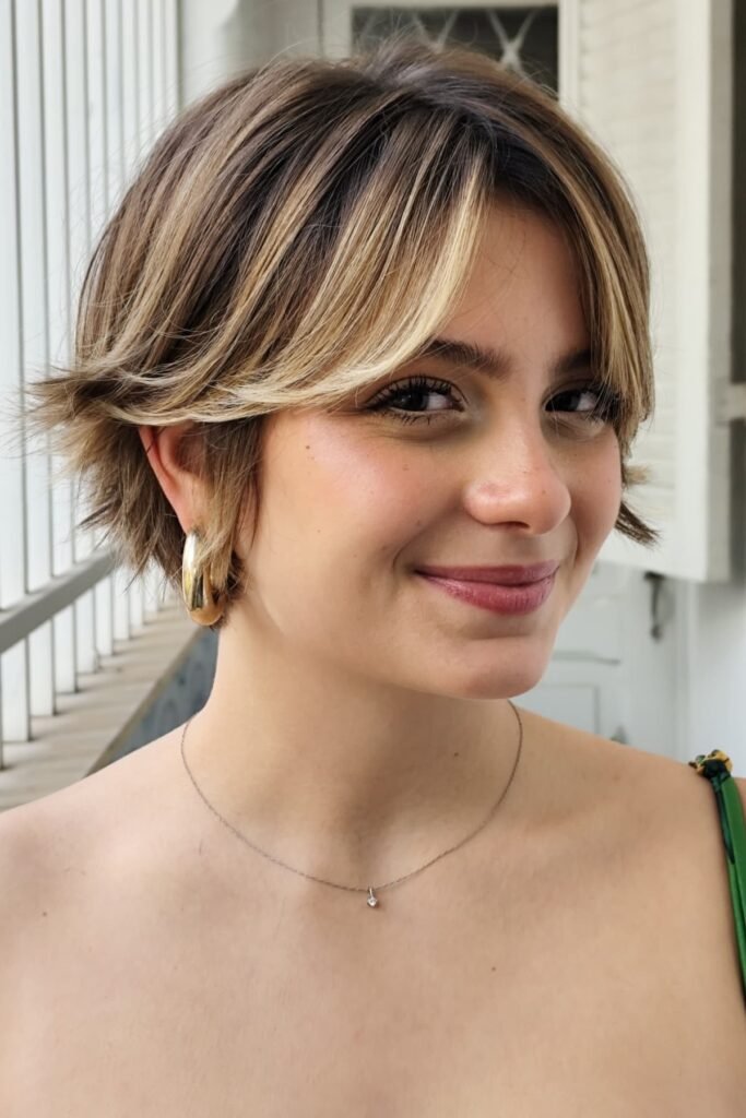 Sun-Kissed Flicked Bob with Long Curtain Bangs