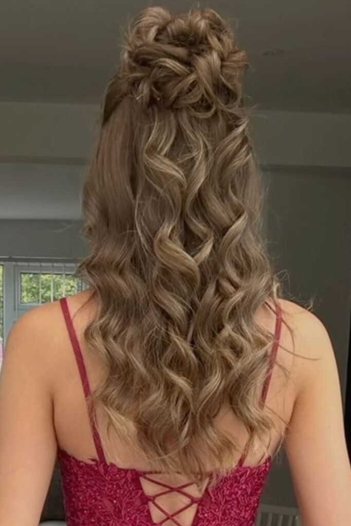 Textured Half-Up Top Knot with Defined Spiral Curls