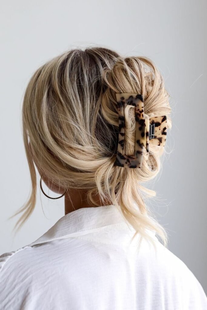 Textured Low Bun with Oversized Rectangular Tortoise Clip