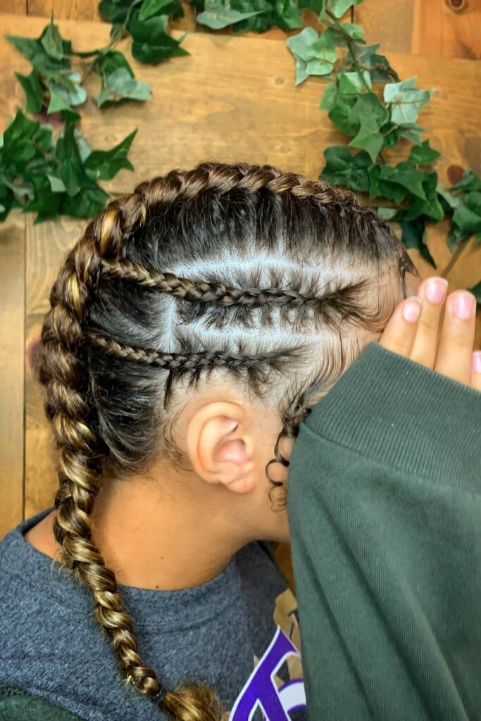 Tight Side Cornrows with Diagonal Accents and Long Twisted Braid