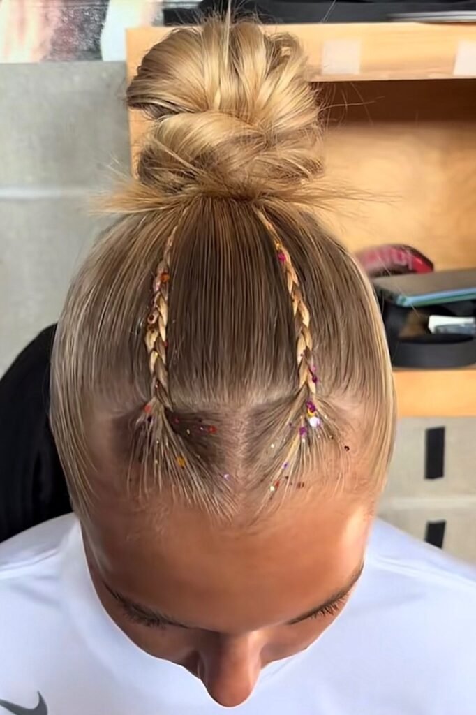 Top Knot Bun with Symmetrical Thin Braids and Chunky Glitter