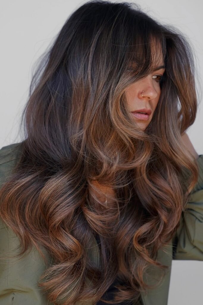 Tousled Chestnut Layers with Soft Curtain Fringe