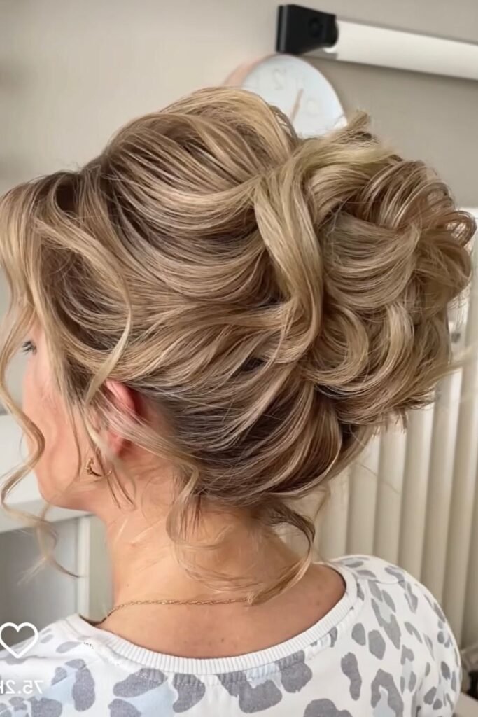 Tousled Multi-Layered Updo with Loose Waves