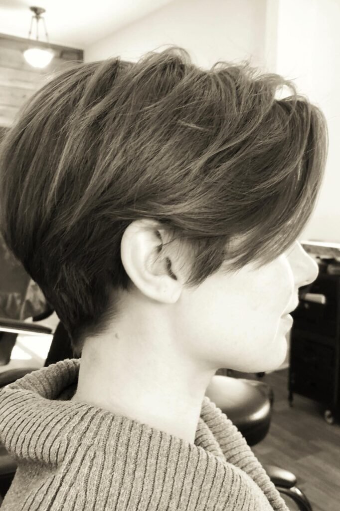 Voluminous Layered Pixie with Side Part