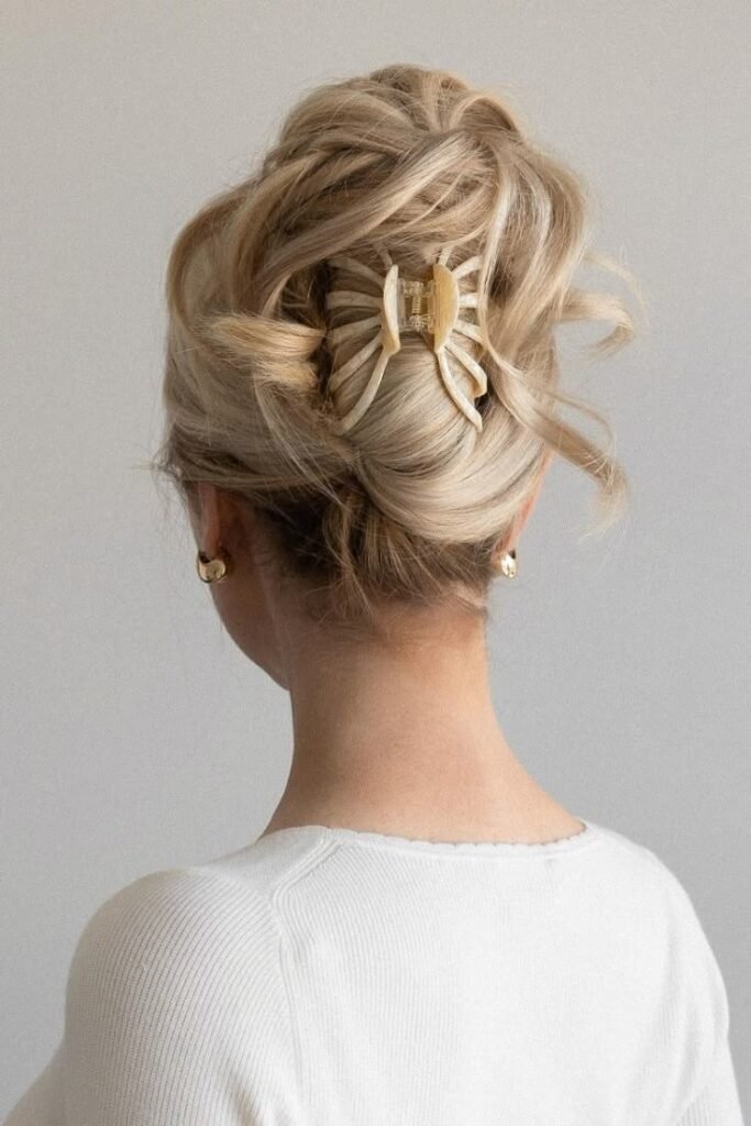 Voluminous Messy Updo with Cream Spider Claw Clip