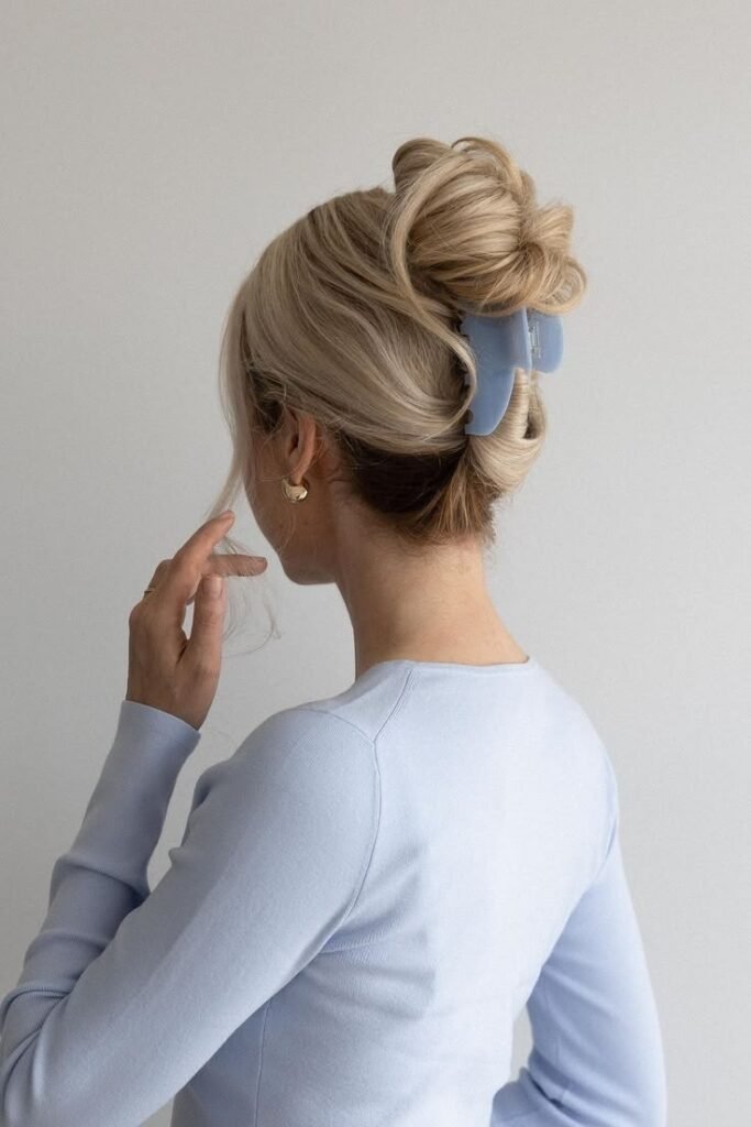 Voluminous Twisted Updo with Matte Blue Claw Clip