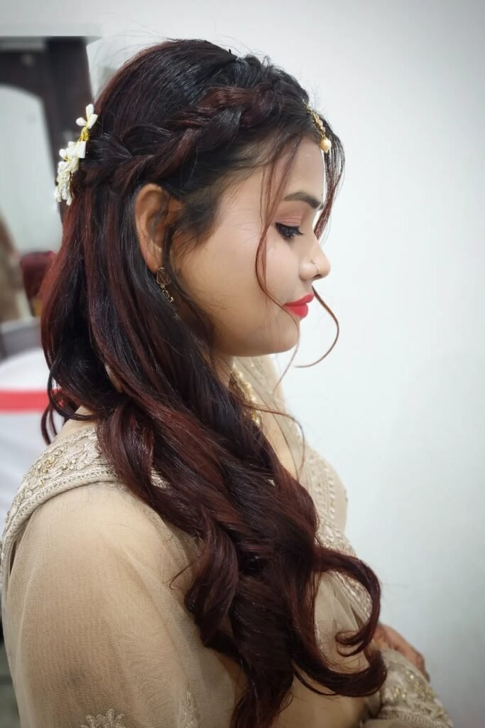Wavy Half-Updo with Dutch Braids and Floral Accents