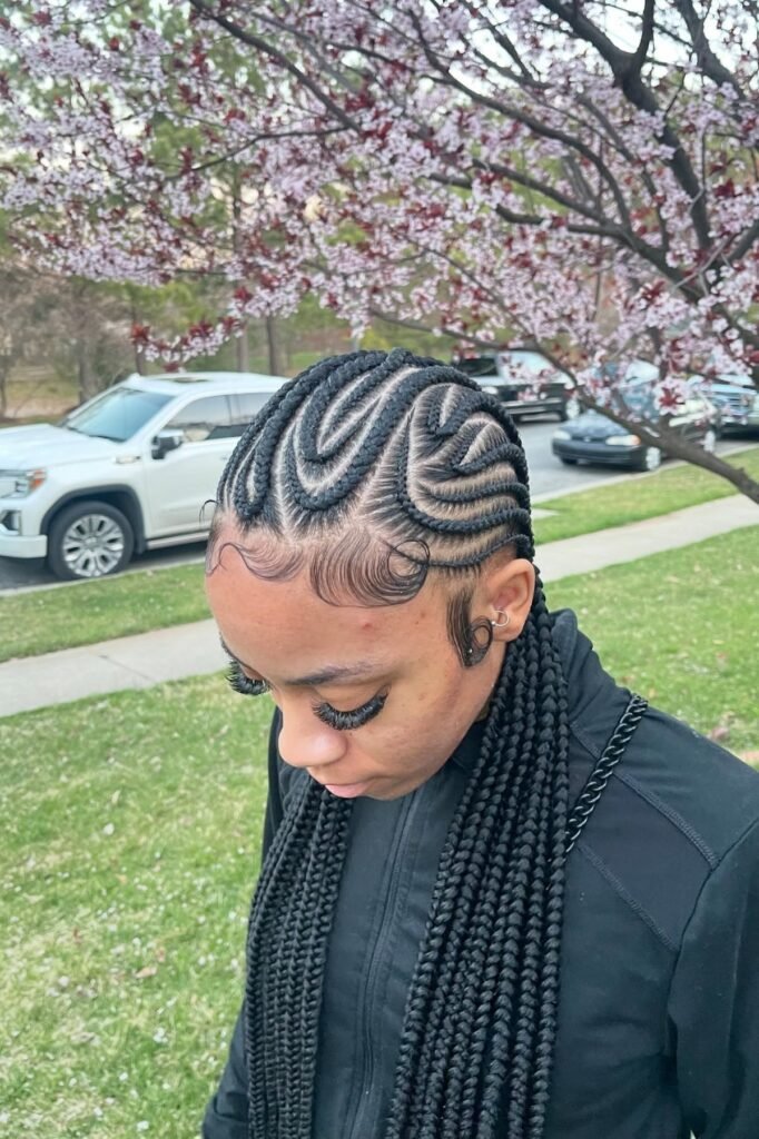 Wavy Patterned Feed-in Braids with Elaborate Baby Hairs