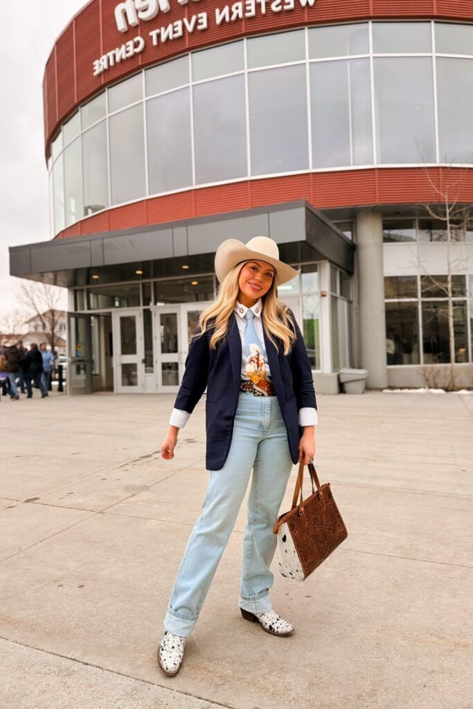 White Collared Shirt with Graphic Tie + Navy Blazer + Light Wash Straight Jeans + Cow-Print Boots