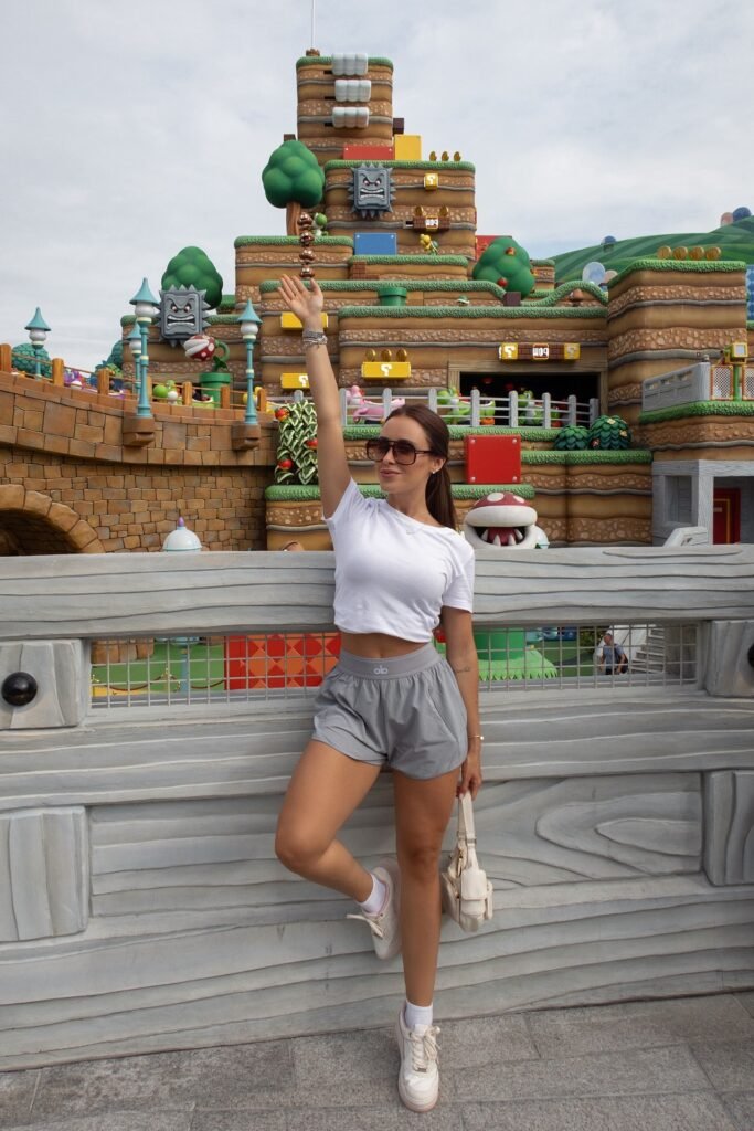 White Crop Top + Grey Athletic Shorts + White Sneakers