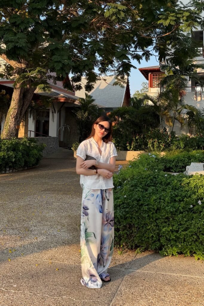 White Eyelet Short-Sleeve Shirt + Floral Wide-Leg Silk Trousers + Black Sandals