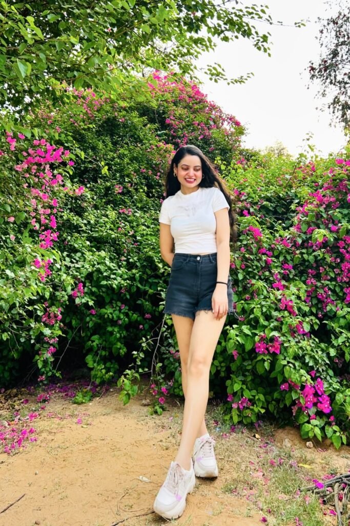 White Fitted T-Shirt + Black Denim Cut-Off Shorts + White Platform Sneakers