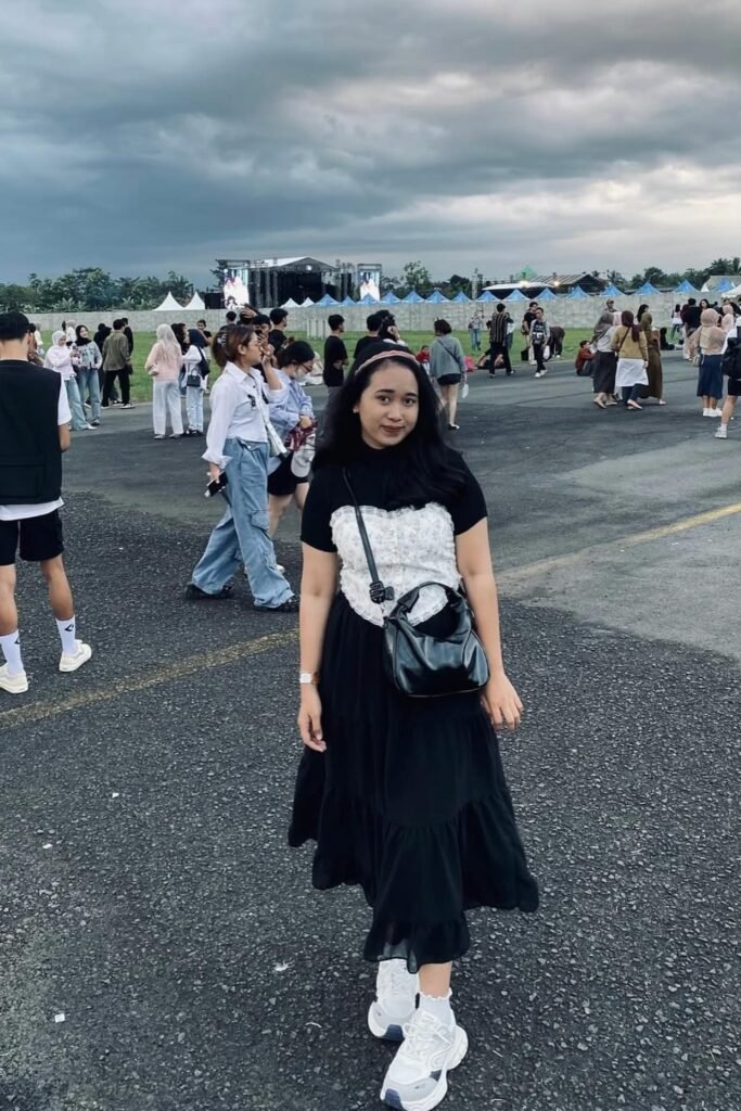 White Lace Corset Top + Black Short-Sleeve T-shirt + Tiered Black Midi Skirt + White Athletic Sneakers